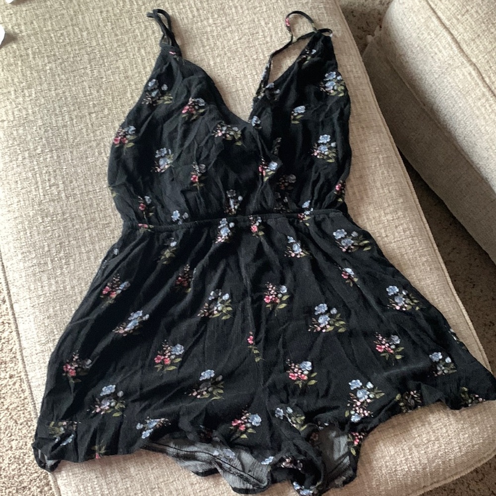 American eagle romper size medium black with flowers